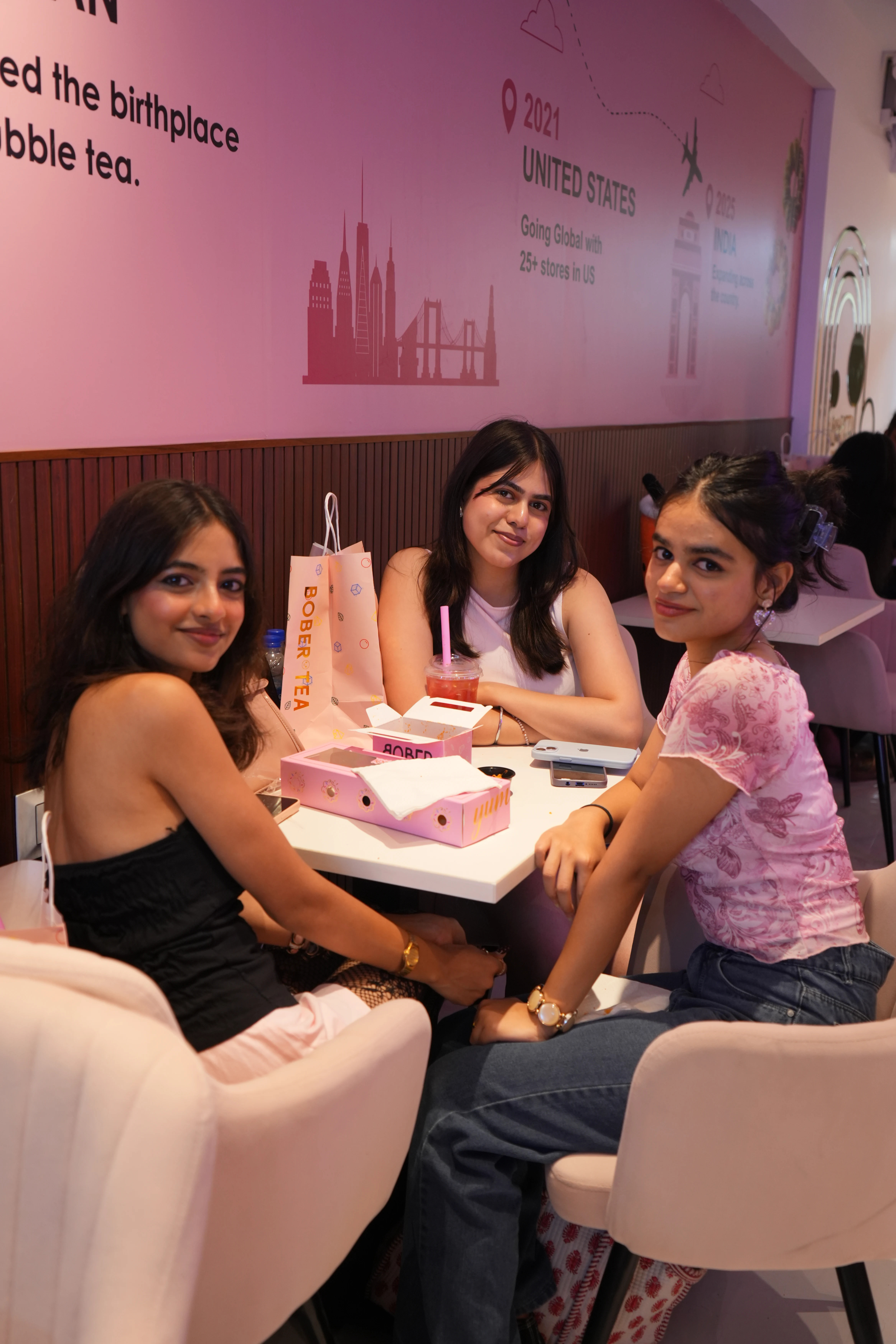 Friends enjoying time together at a Bober Tea café
